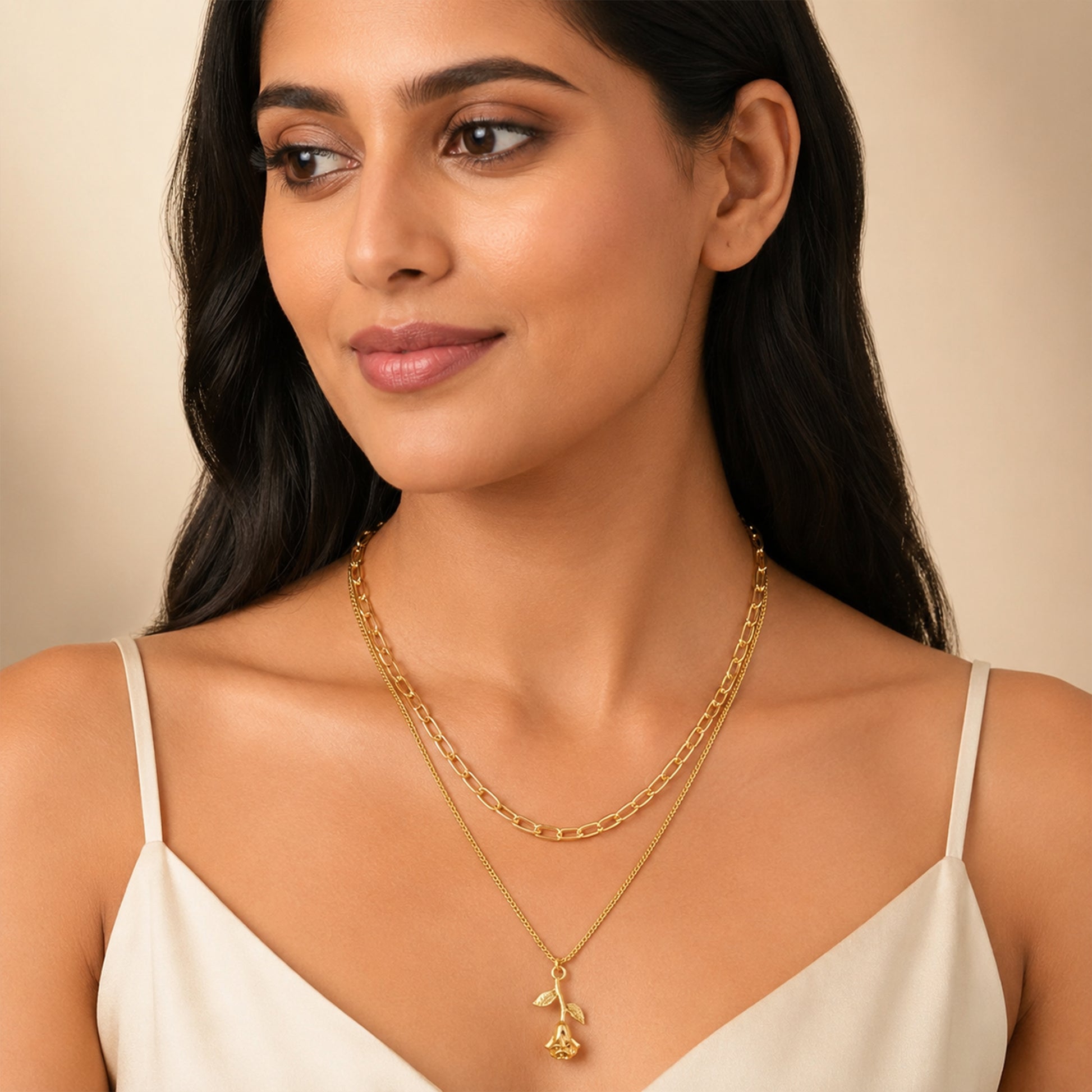 Close-up view of gold rose flower pendant necklace