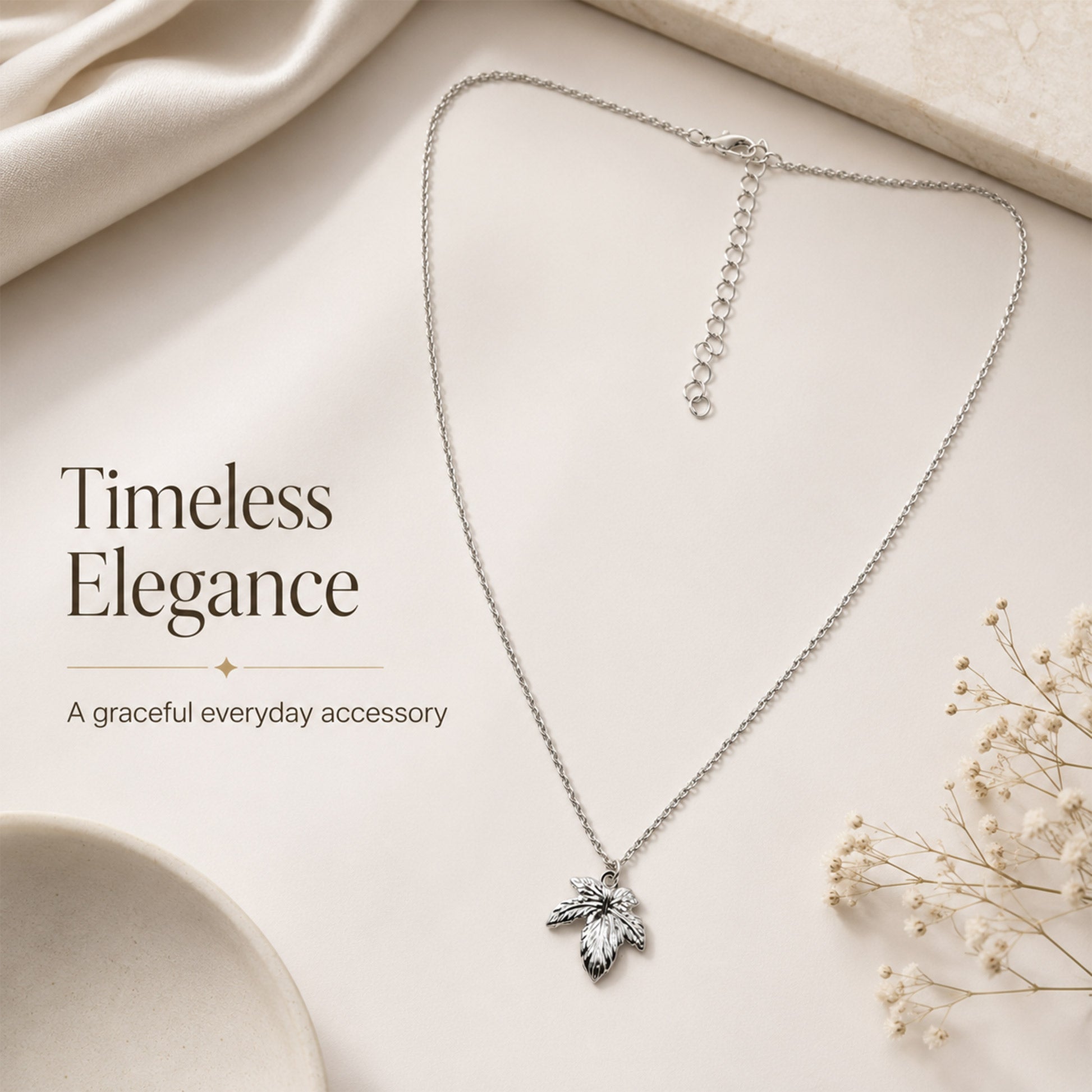 Silver plated botanical pendant necklace with polished finish