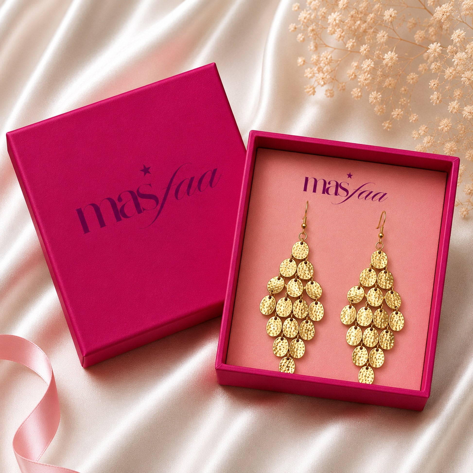 Gold cascading earrings styled as elegant fashion jewellery for women