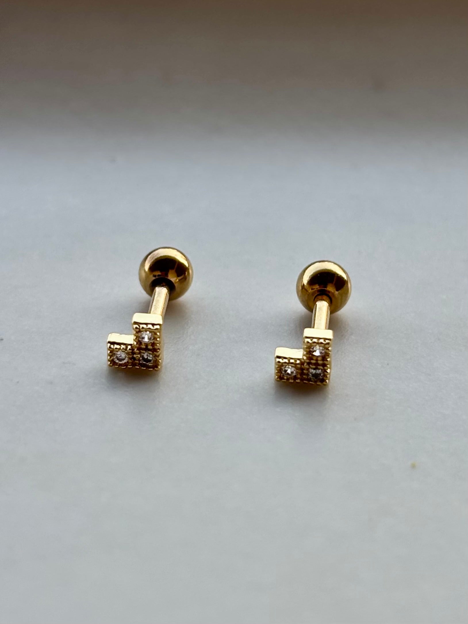 18k gold-plated Rory ball-back stud earrings �? minimal modern sleek hypoallergenic studs, anti-tarnish and waterproof for everyday wear.