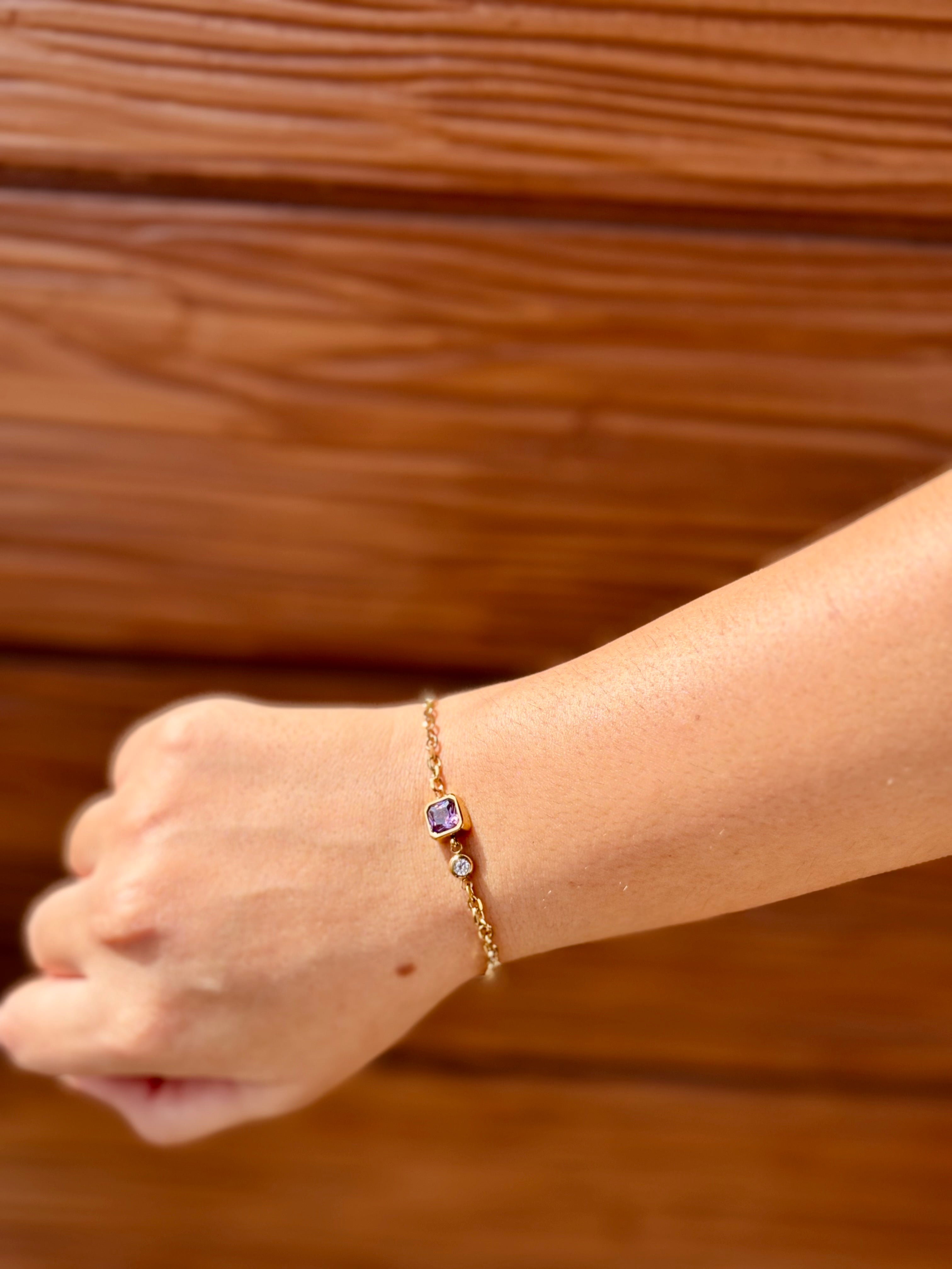 Styled view of Arya bracelet �? 18k gold-plated colour-pop white and purple stone bracelet for evening and gifting.