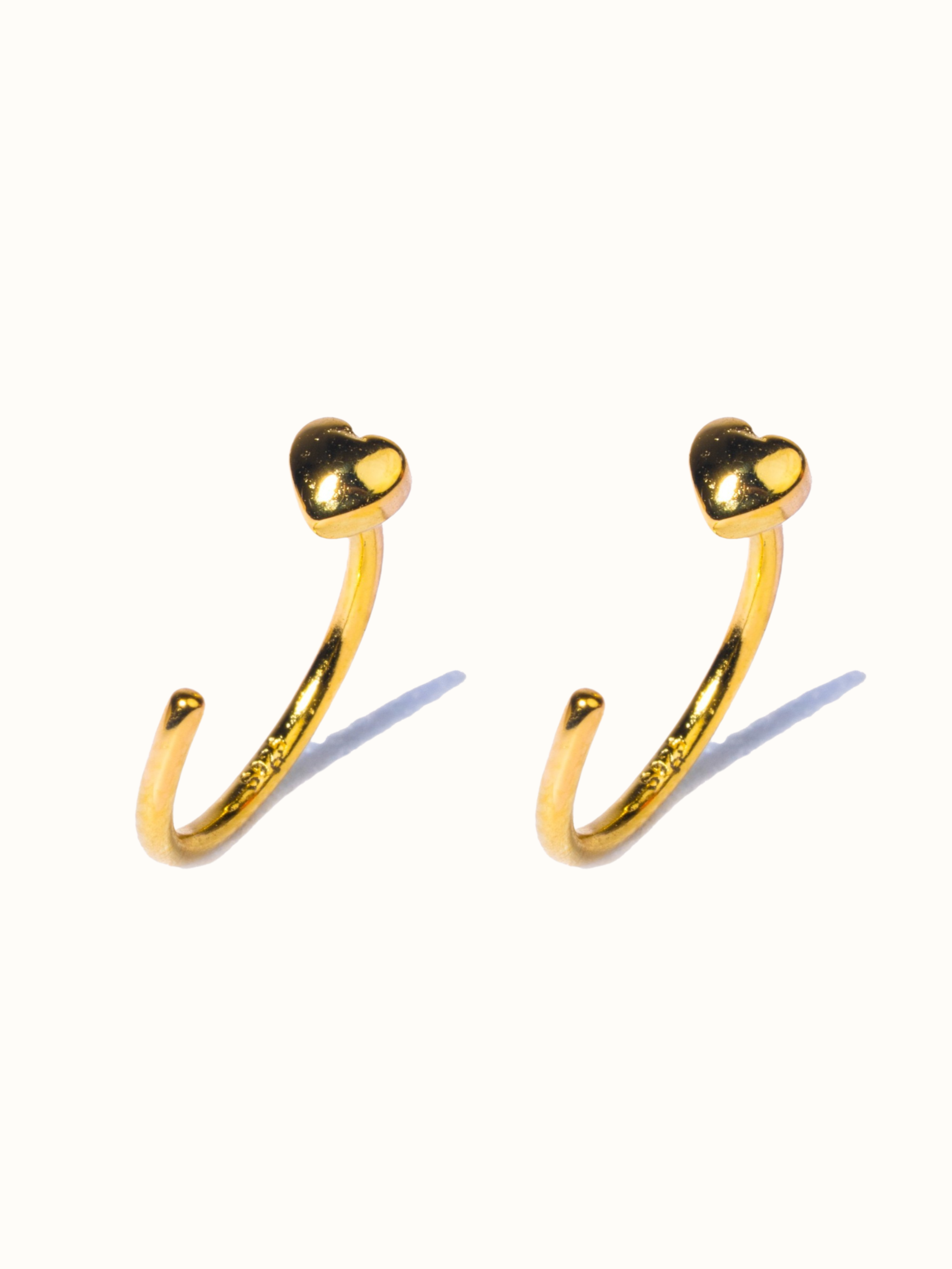 925 sterling silver heart hoop earrings �? poke-free hypoallergenic hoops, anti-tarnish and waterproof. Sleep-safe for kids and gentle for sensitive ears.