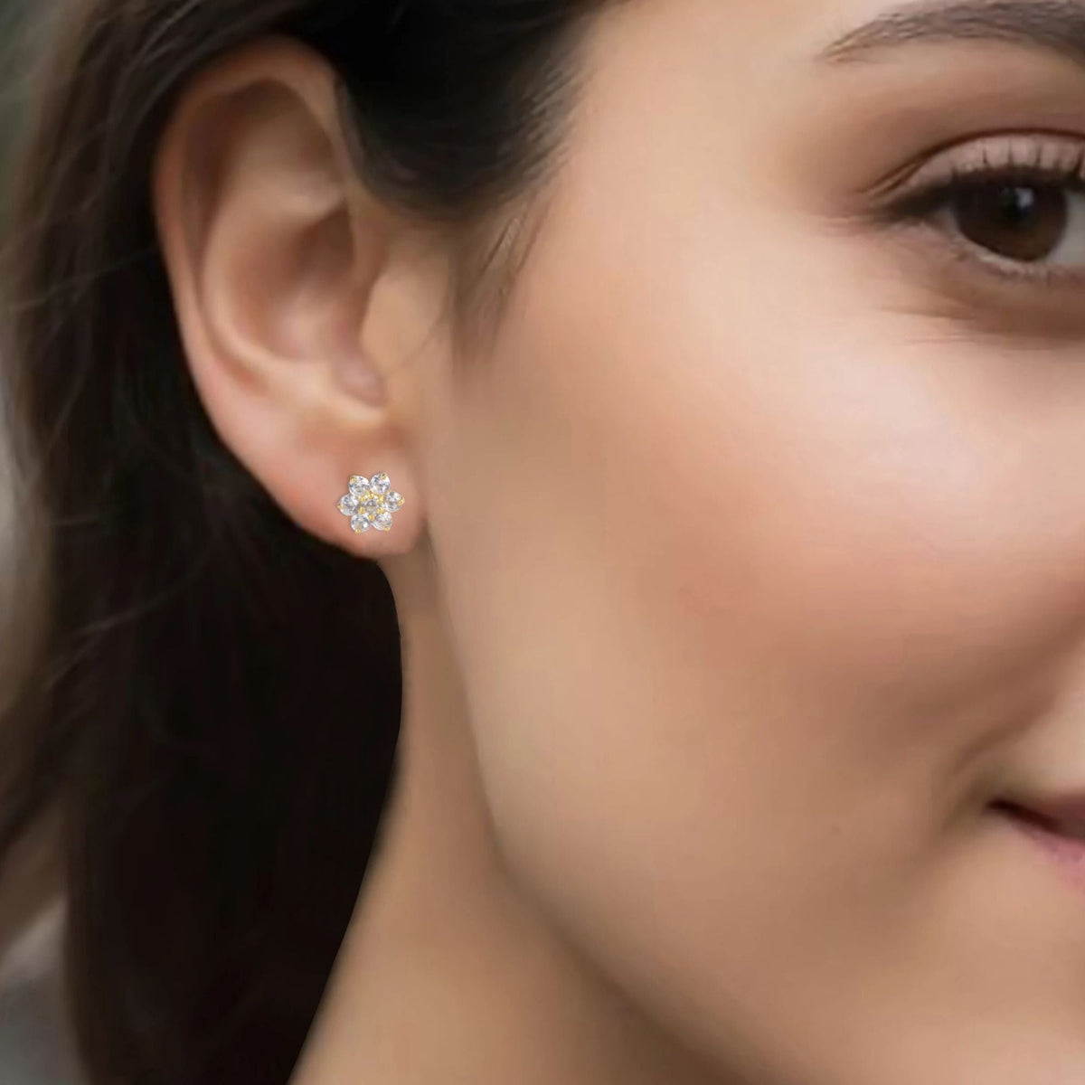 925 Silver eartops in Traditional Girda (Clustre) setting of AD (Zircon) stones with prongs & push closure with gold plating.