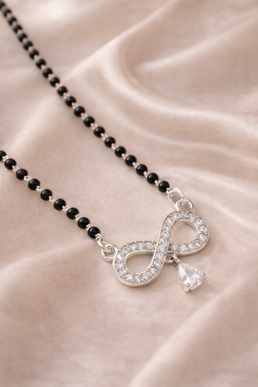 Elegant Black Beads Mangalsutra with Sparkling Infinity Pendant