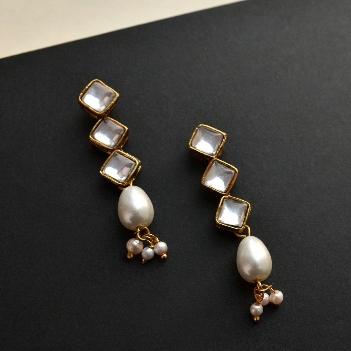 Kundan choker set in gold-tone with matching earrings and long bridal necklace, perfect for wedding functions , festive and bridal wear