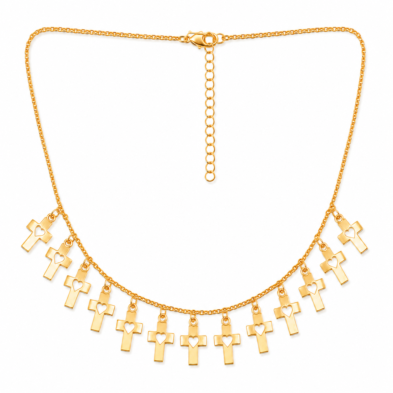 Gold cross heart charm necklace on white background