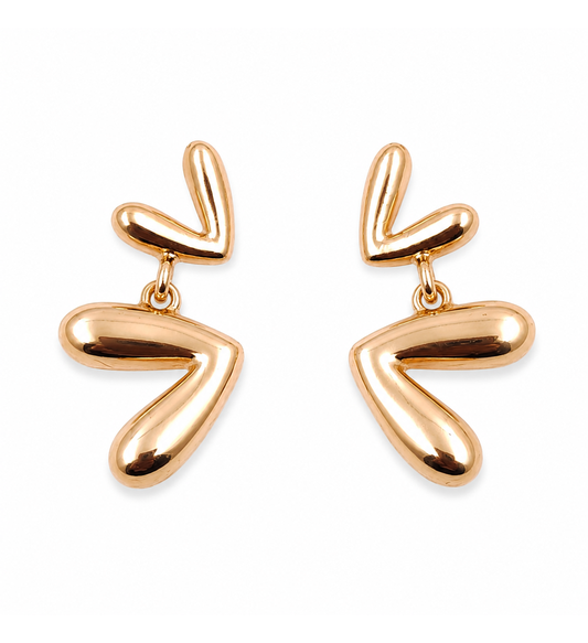 Rose gold abstract drop earrings pair on white background