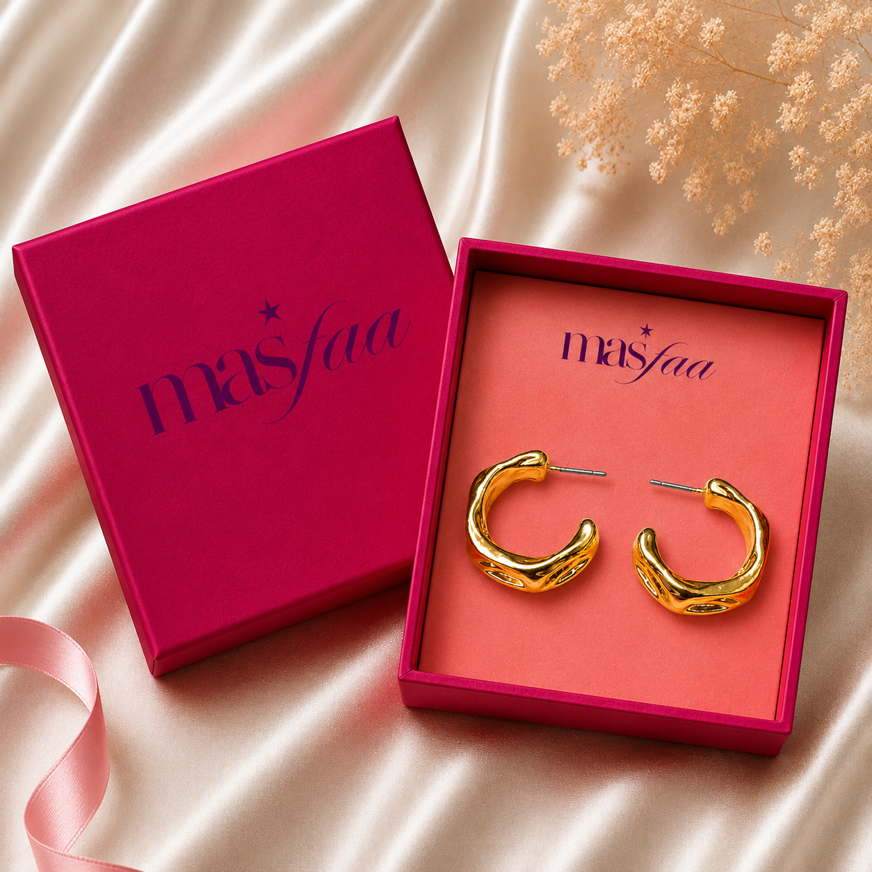 Gold wave hoops styled as elegant fashion jewellery for women