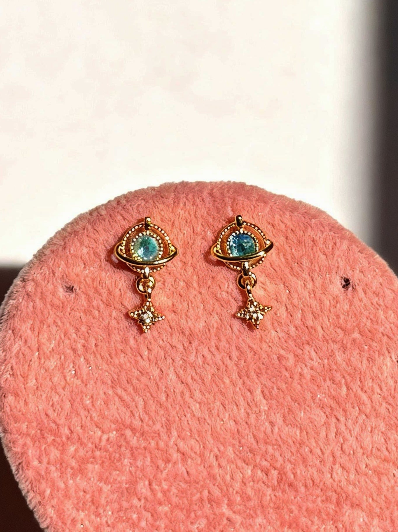Pair of gold-plated Eterna studs �? minimal sleep-friendly stud earrings for everyday and ear-stack styling.