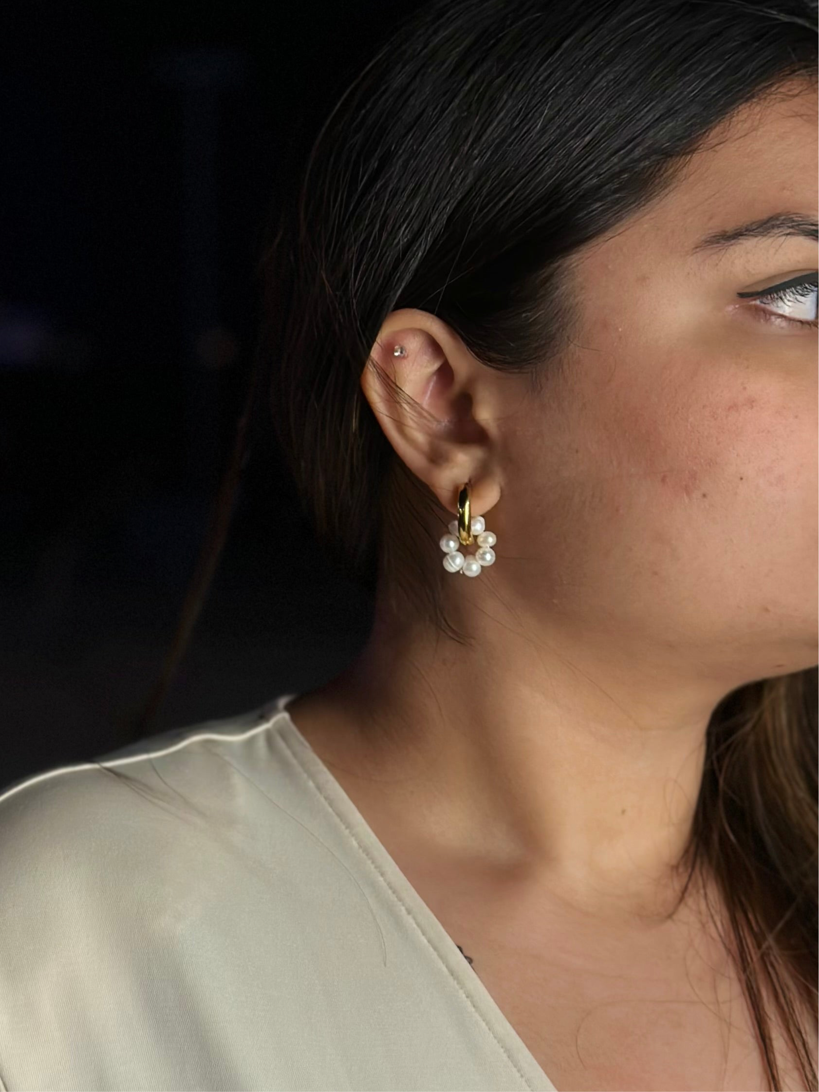 Alina drop earrings displayed �? 18k gold-plated 2-way pearl drops for office and evening wear.