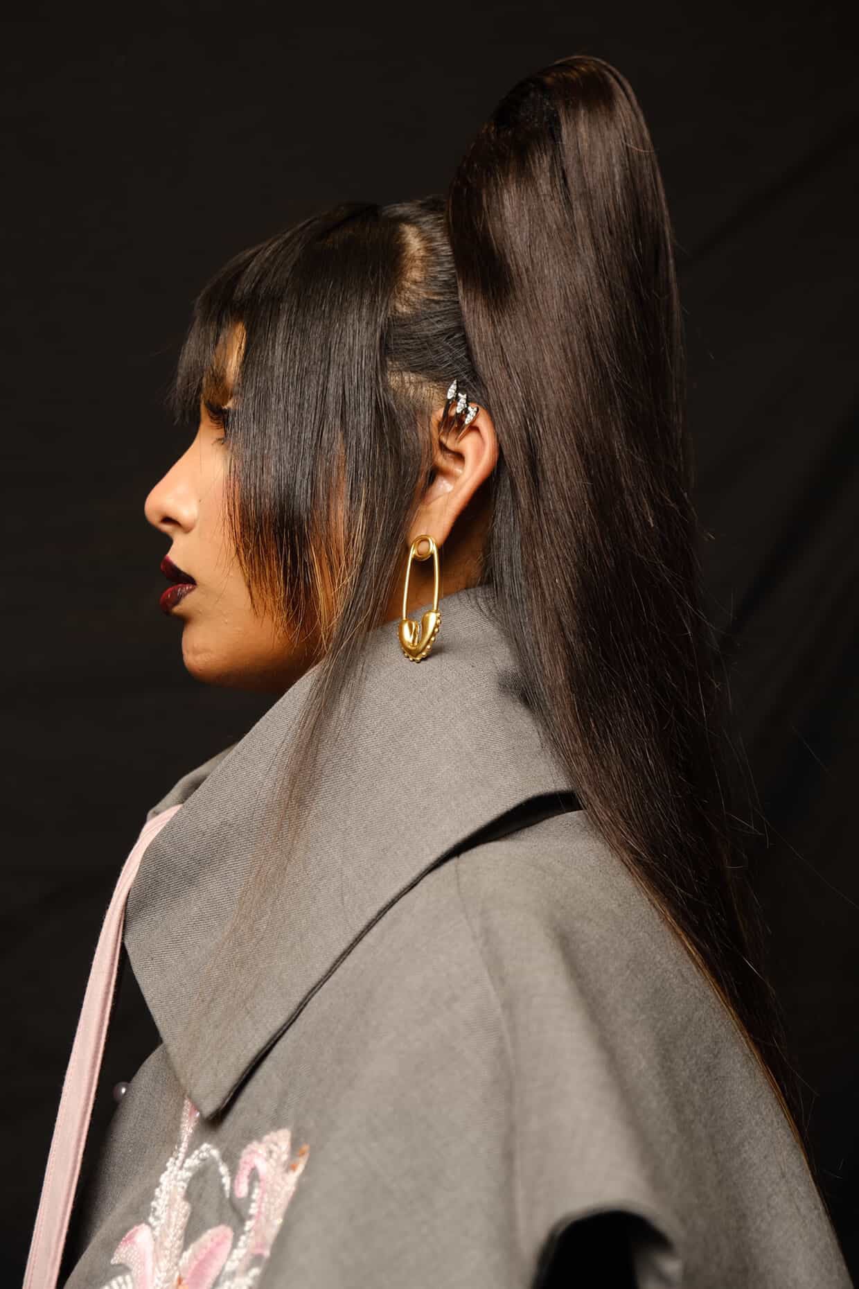 Pair of Pin earrings �? 18k gold-plated unique pin-style drops for statement evening looks.