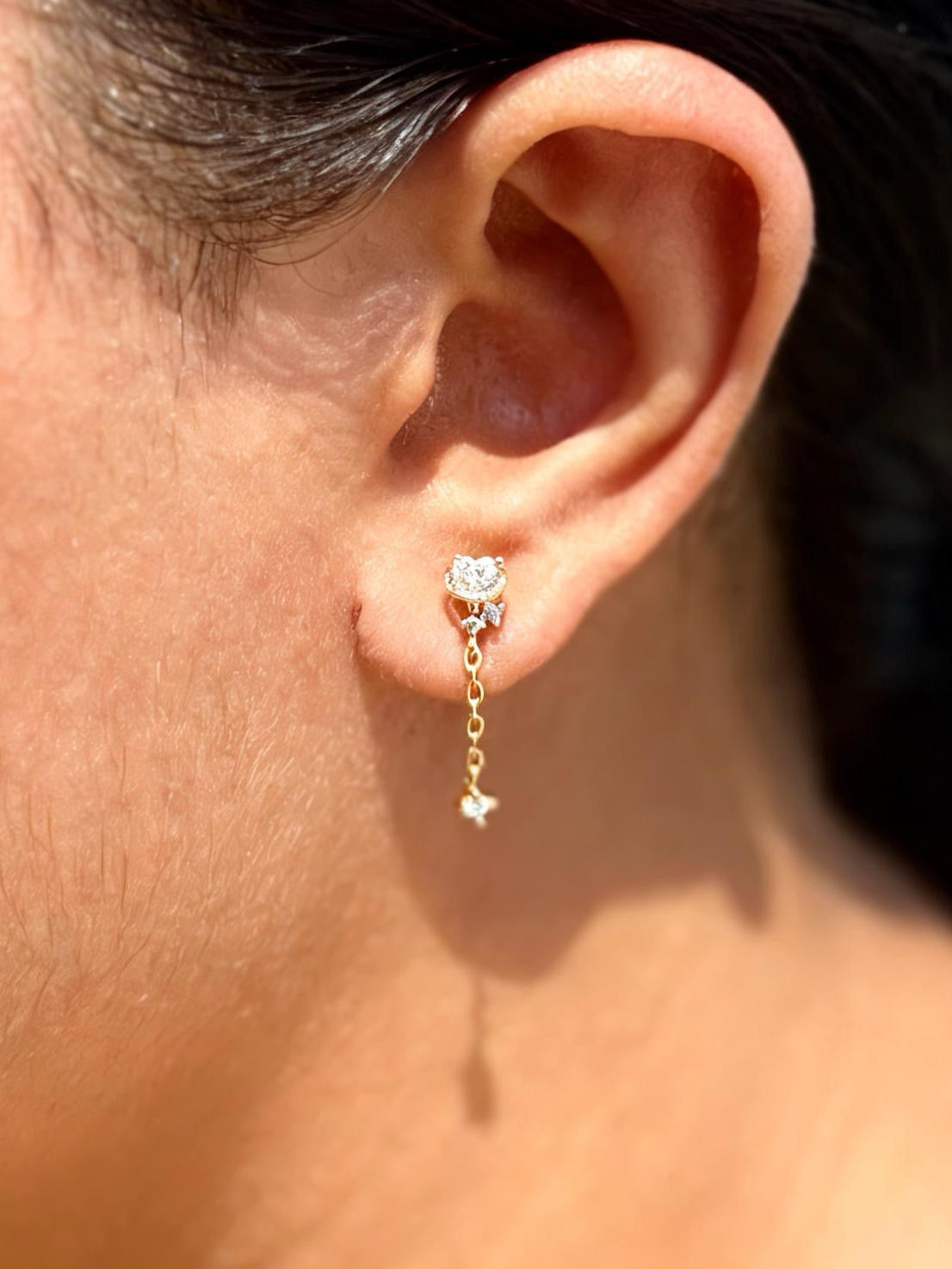 Detail shot of stone drop ball-back stud earrings �? 18k gold-plated versatile stone drop studs for everyday and gifting.