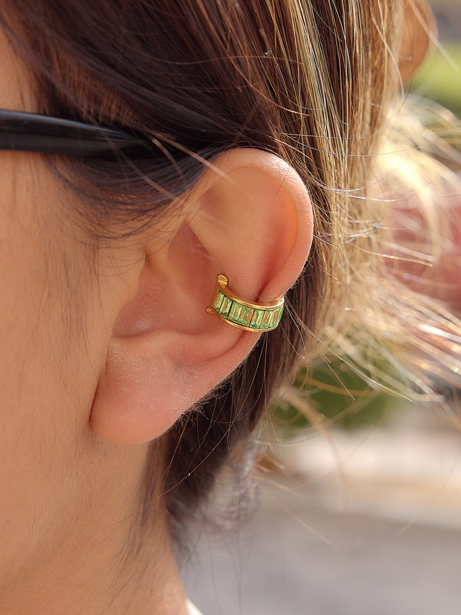 Styled view of Ari ear cuff �? sleek 18k gold-plated no-piercing single-piece cuff for festive and everyday looks.