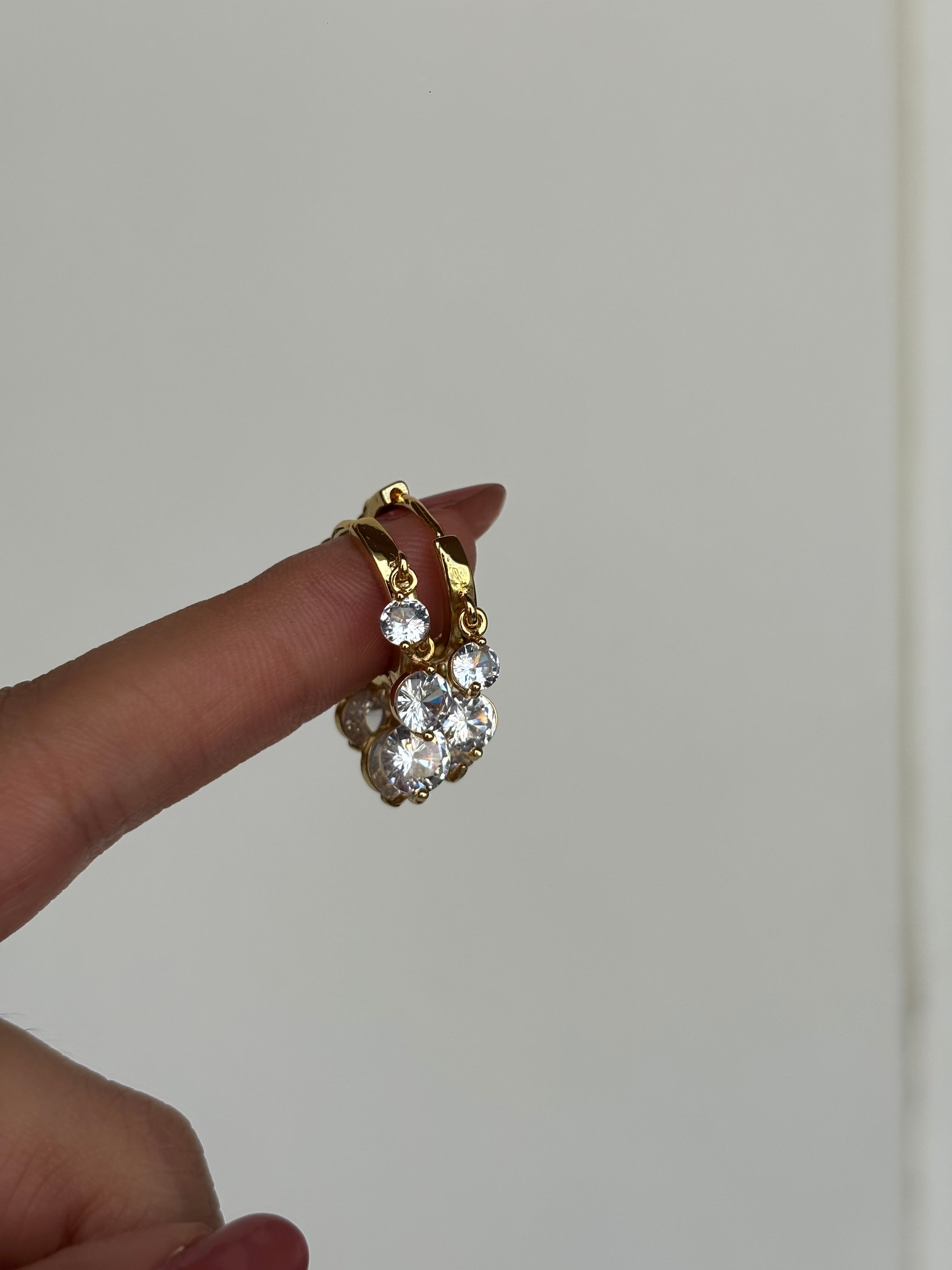 Gold-plated Daily Dazzle 2 hoop earrings displayed together �? versatile go-to hoops for daily styling.