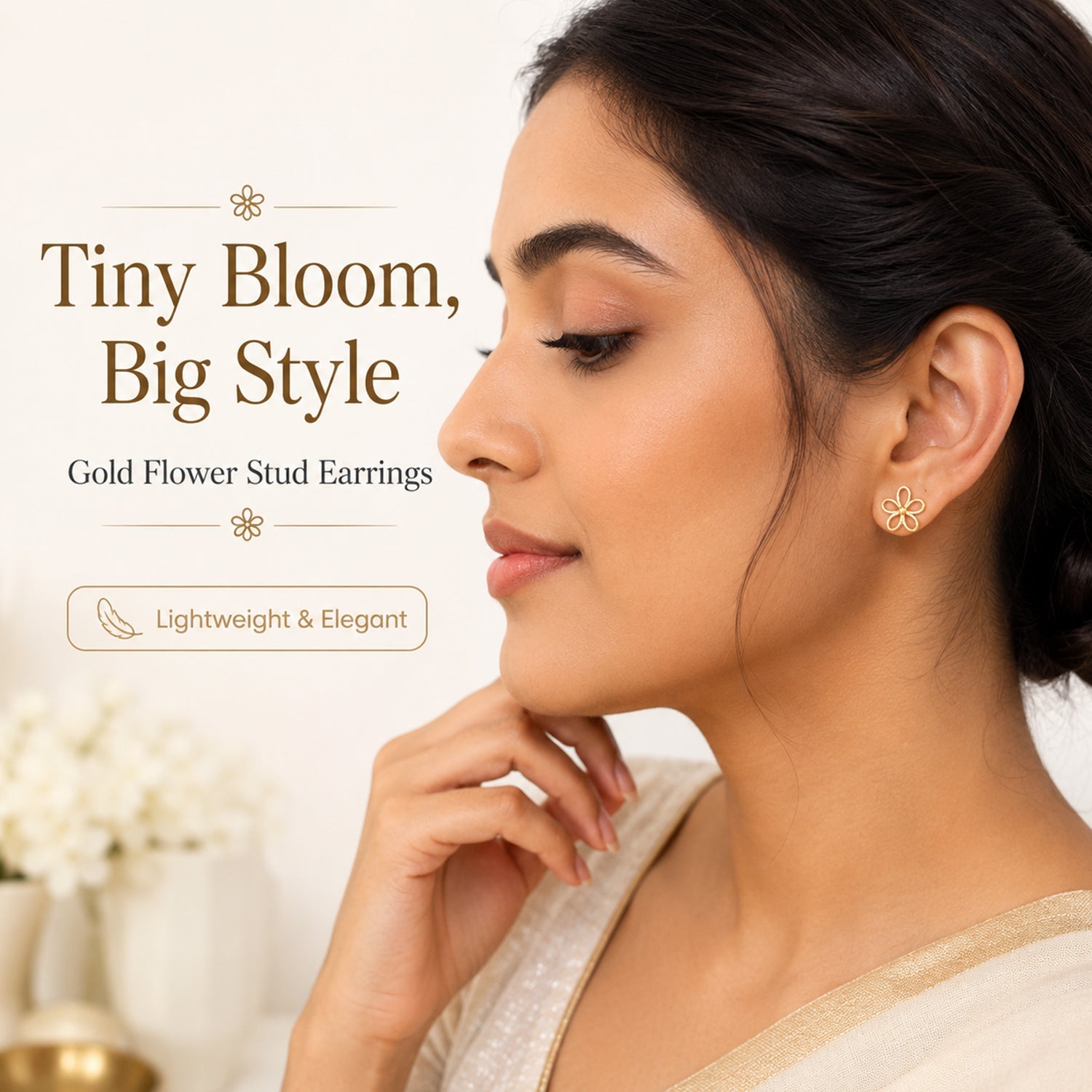 Close-up view of gold floral earrings with open petal design