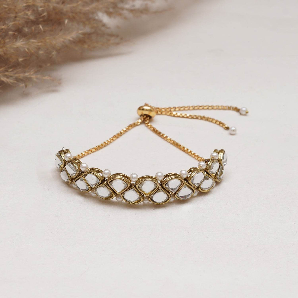 Golden Triangle Kundan With White Pearls Adjustable Bracelet - BeAbhika.com