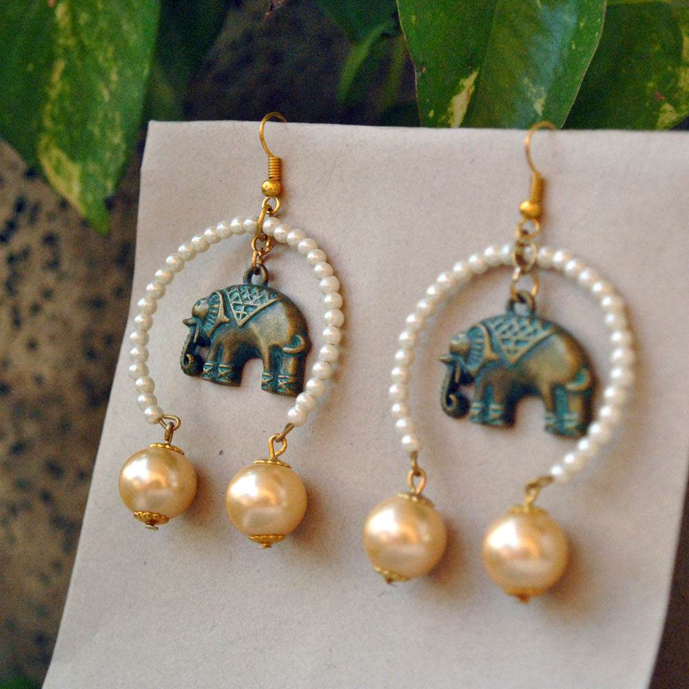 Traditional Kundan earrings in gold-tone, perfect for weddings and festive wear