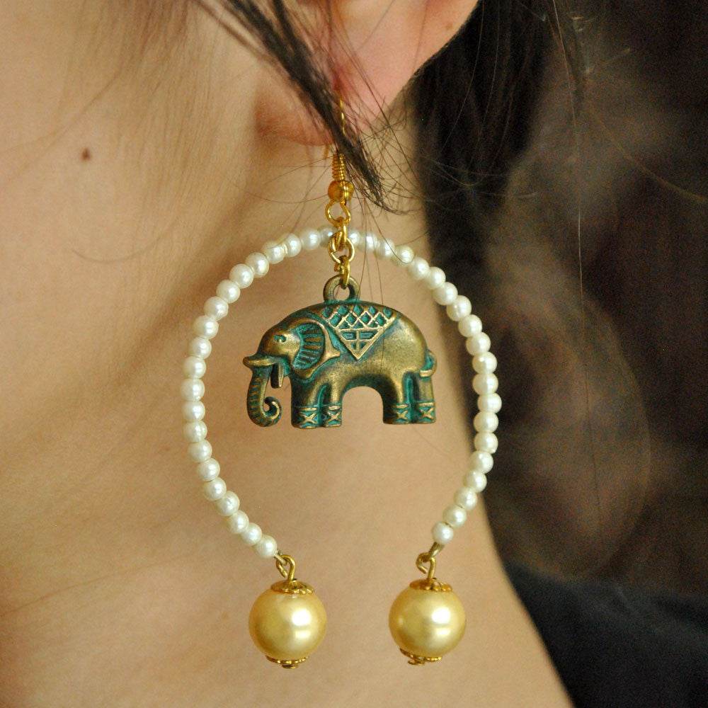 Traditional Kundan earrings in gold-tone, perfect for weddings and festive wear