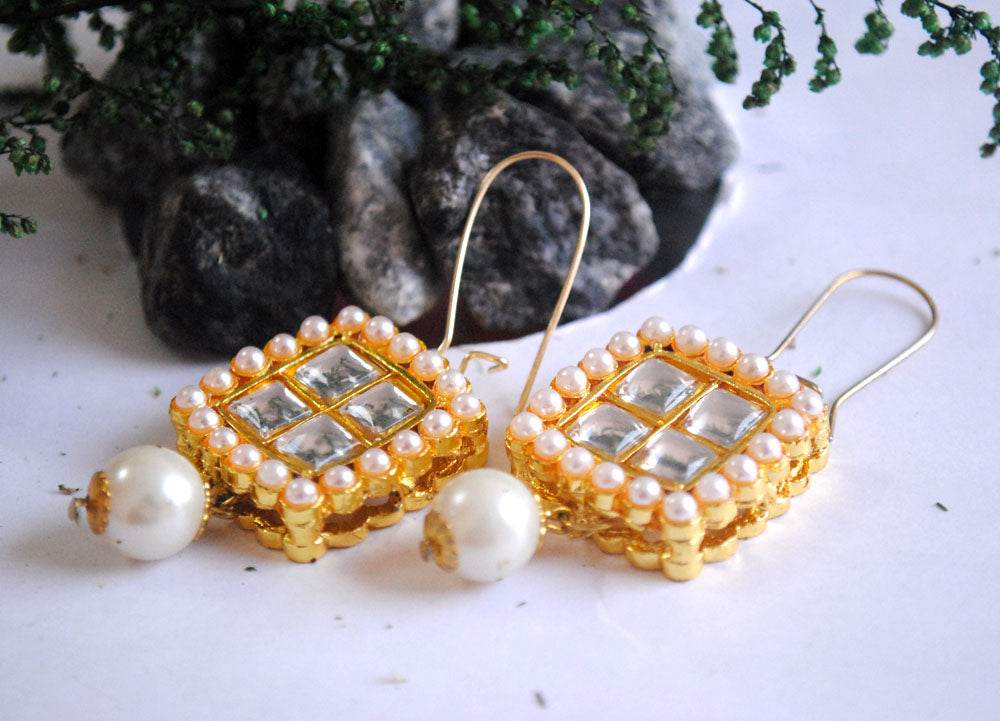 Traditional Kundan earrings in gold-tone, perfect for weddings and festive wear