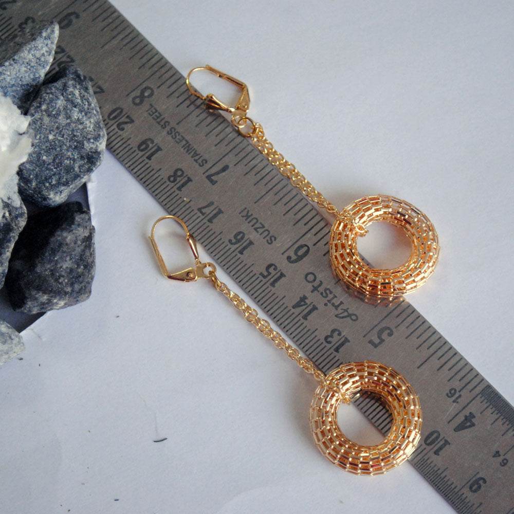 Traditional Kundan earrings in gold-tone, perfect for weddings and festive wear