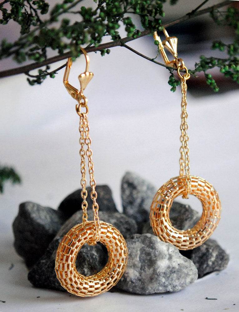 Traditional Kundan earrings in gold-tone, perfect for weddings and festive wear