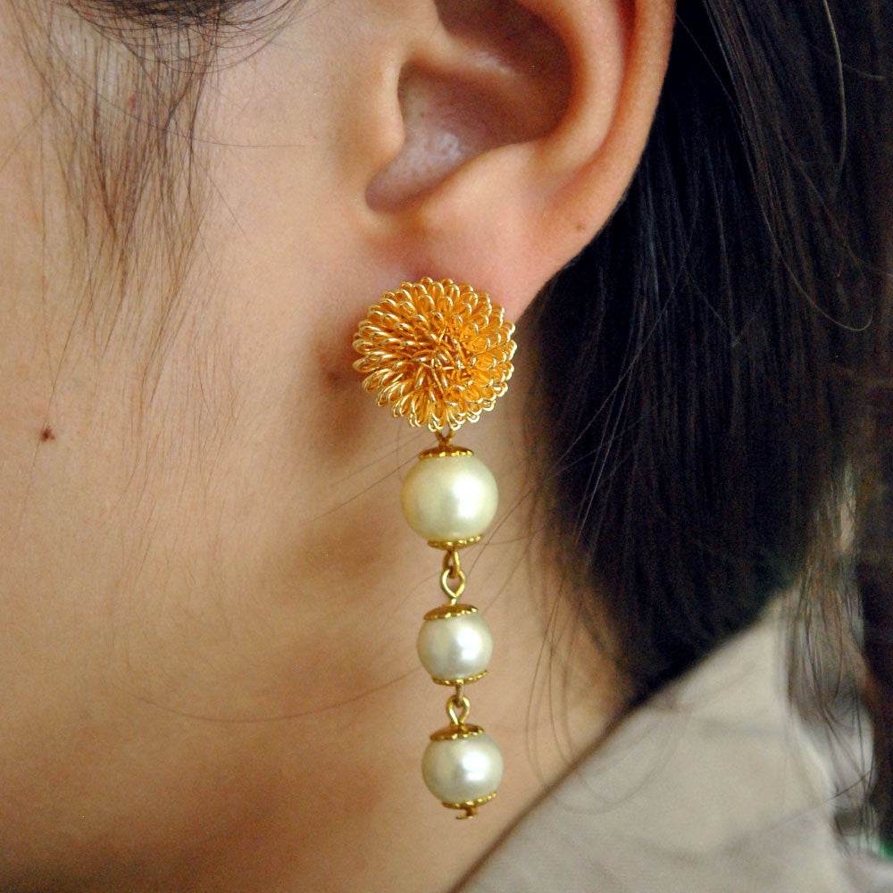 Traditional Kundan earrings in gold-tone, perfect for weddings and festive wear