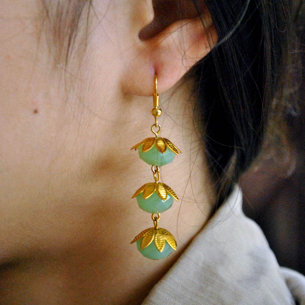 Traditional Kundan earrings in gold-tone, perfect for weddings and festive wear