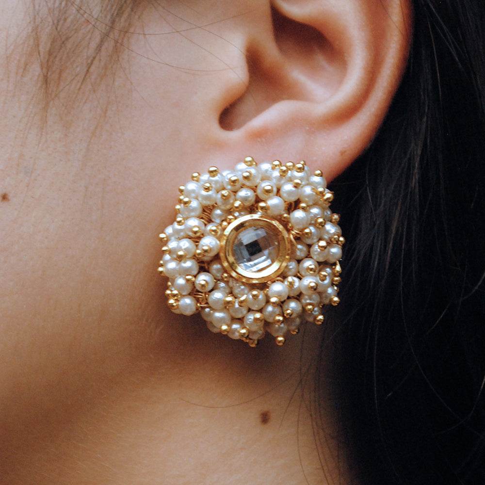 Traditional Kundan earrings in gold-tone, perfect for weddings and festive wear
