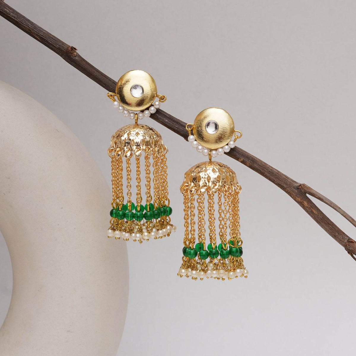 Traditional Kundan earrings in gold-tone, perfect for weddings and festive wear