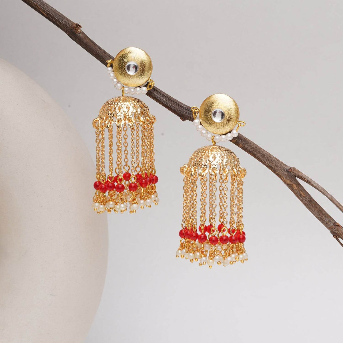 Traditional Kundan earrings in gold-tone, perfect for weddings and festive wear