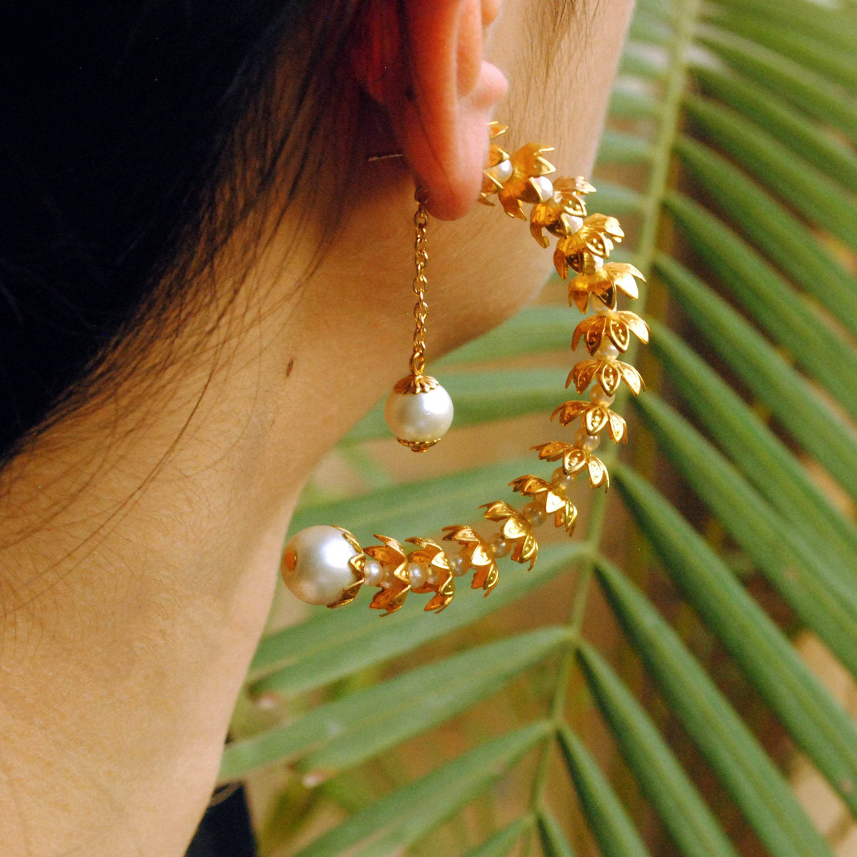 Traditional Kundan earrings in gold-tone, perfect for weddings and festive wear