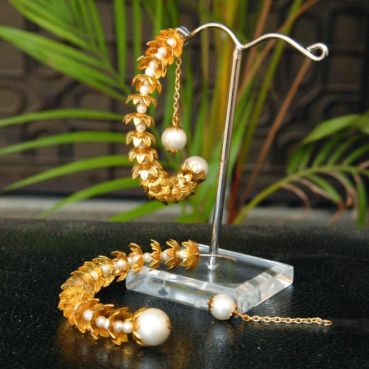 Traditional Kundan earrings in gold-tone, perfect for weddings and festive wear