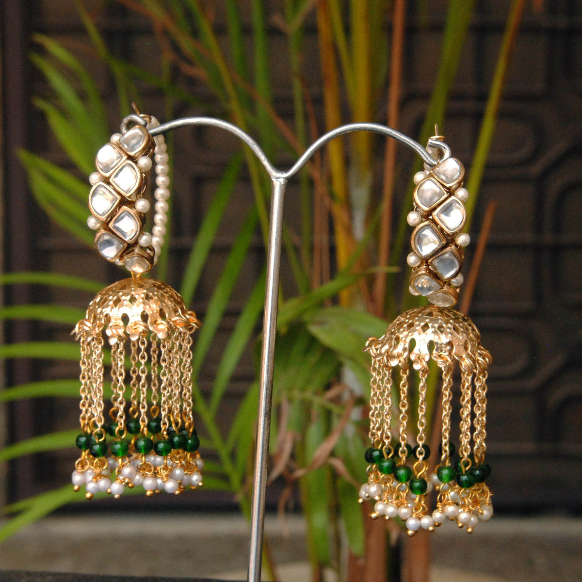 Traditional Kundan earrings in gold-tone, perfect for weddings and festive wear