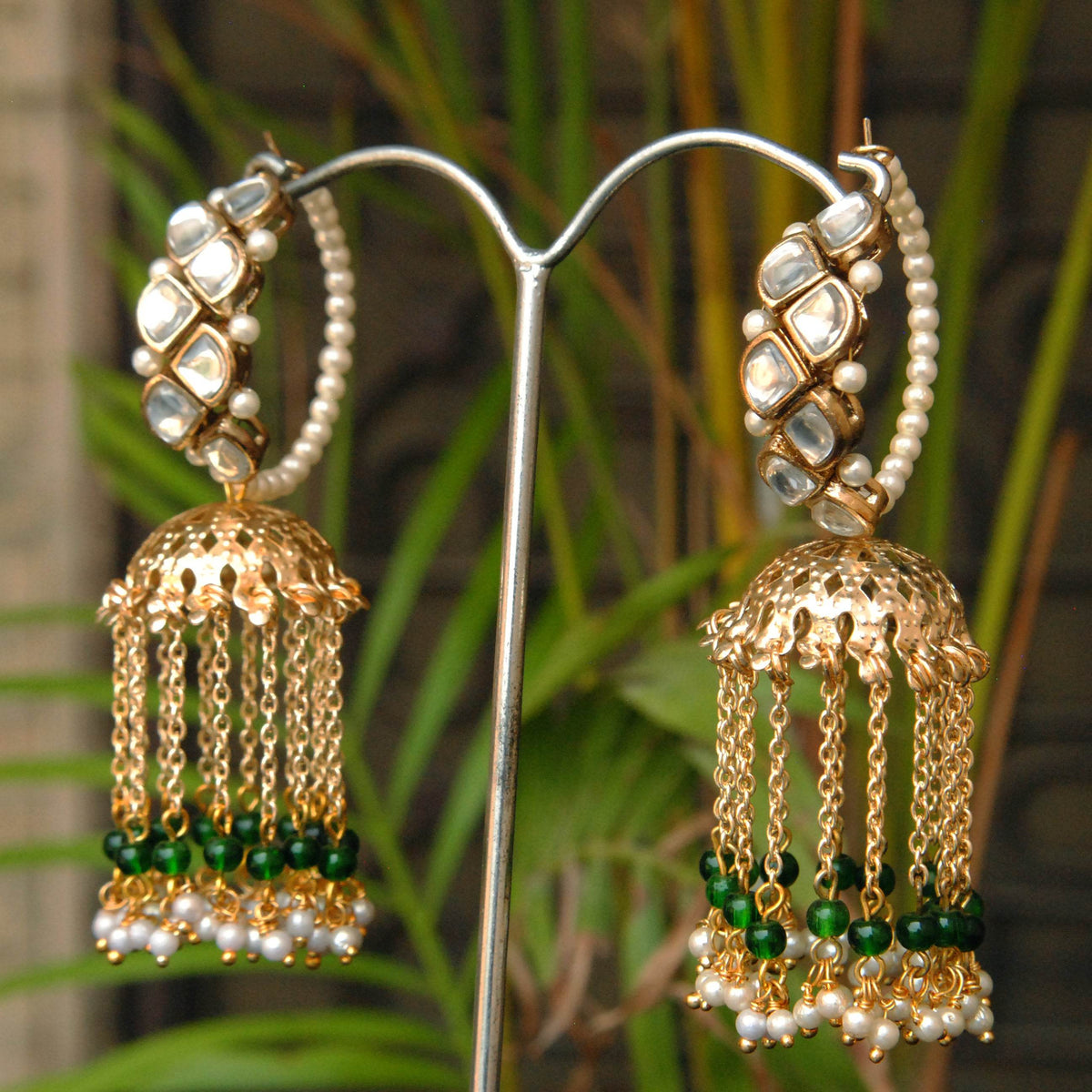 Traditional Kundan earrings in gold-tone, perfect for weddings and festive wear