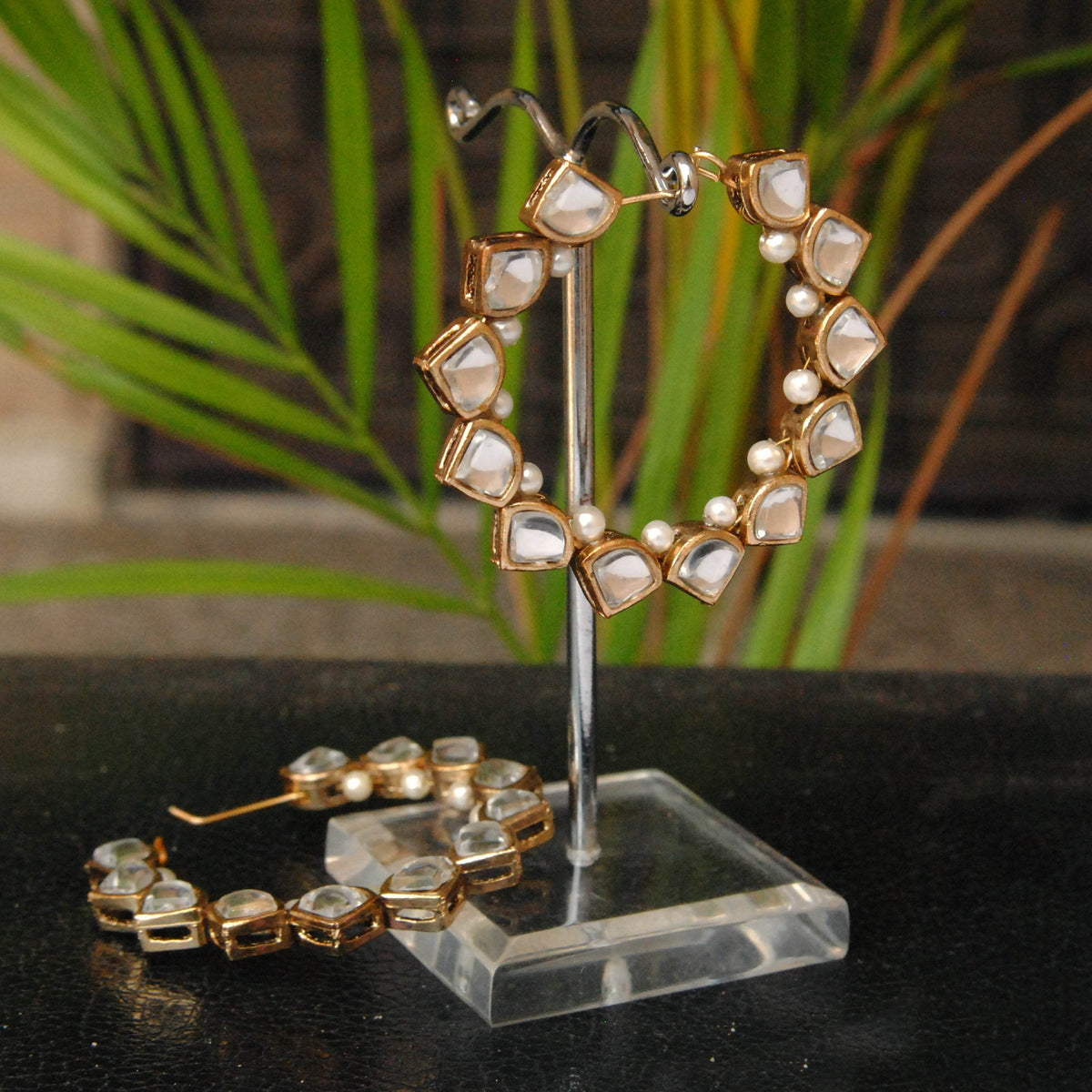 Traditional Kundan earrings in gold-tone, perfect for weddings and festive wear