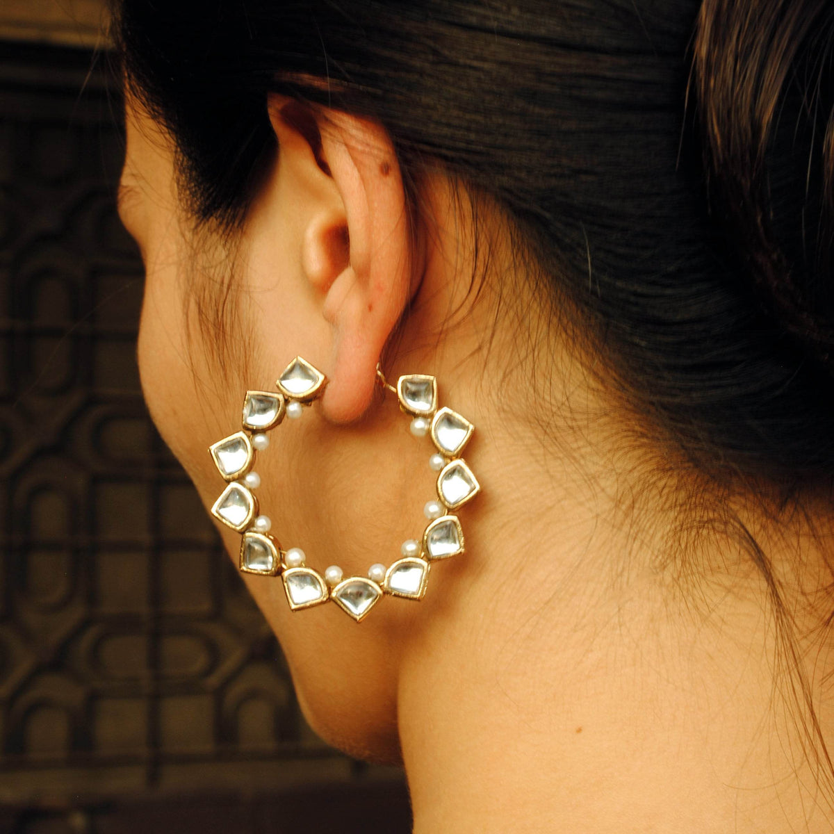 Traditional Kundan earrings in gold-tone, perfect for weddings and festive wear