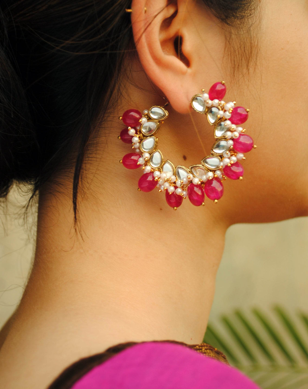 Traditional Kundan earrings in gold-tone, perfect for weddings and festive wear