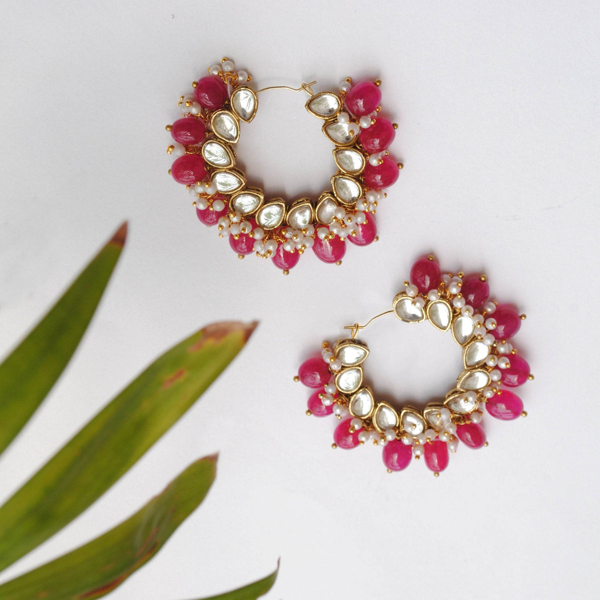 Traditional Kundan earrings in gold-tone, perfect for weddings and festive wear