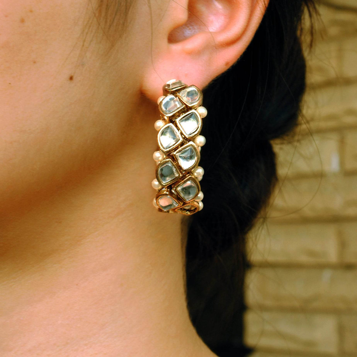 Traditional Kundan earrings in gold-tone, perfect for weddings and festive wear