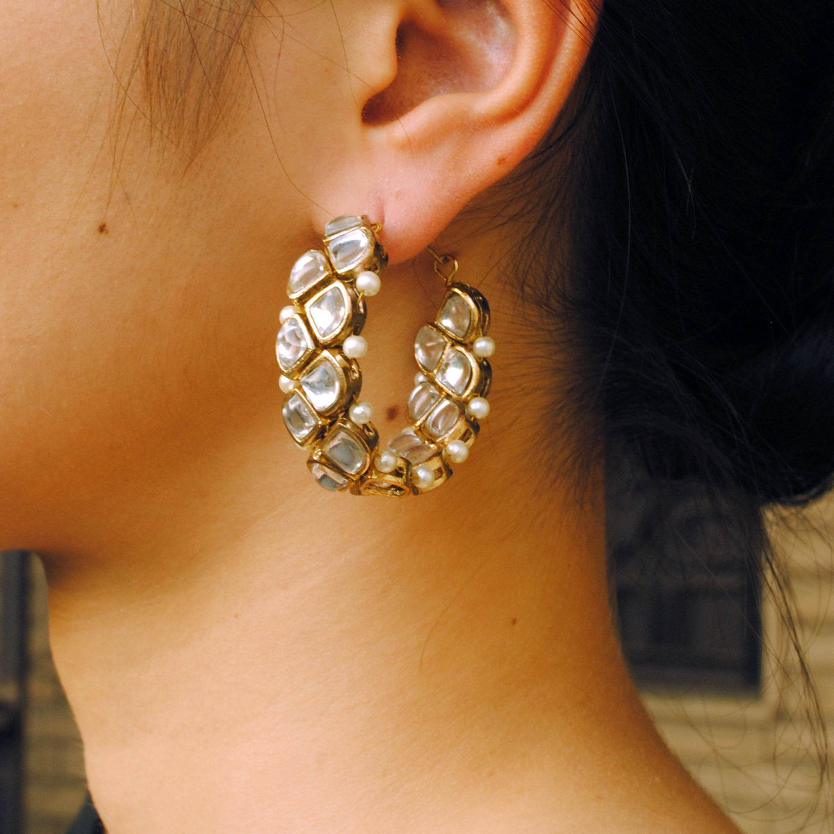 Traditional Kundan earrings in gold-tone, perfect for weddings and festive wear