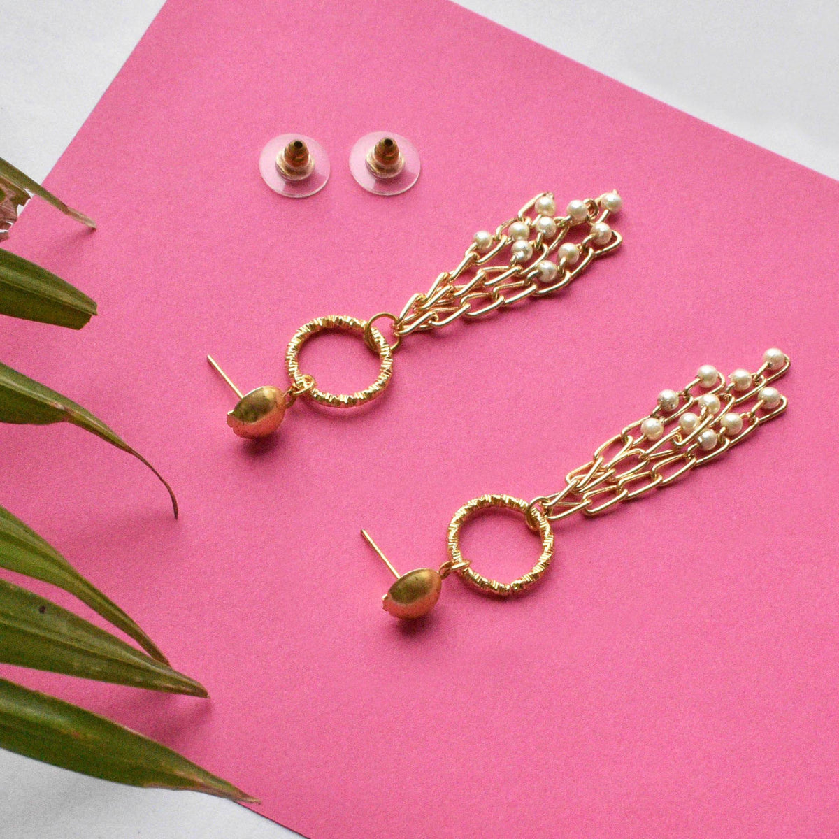 Traditional Kundan earrings in gold-tone, perfect for weddings and festive wear