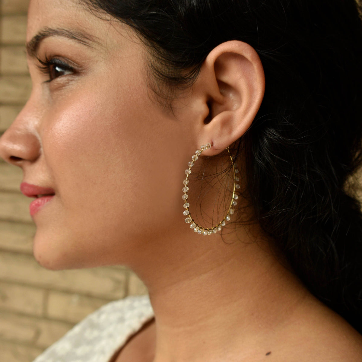 Traditional Kundan earrings in gold-tone, perfect for weddings and festive wear