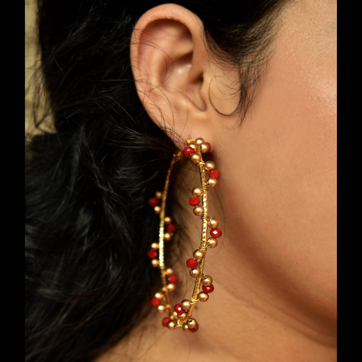 Traditional Kundan earrings in gold-tone, perfect for weddings and festive wear