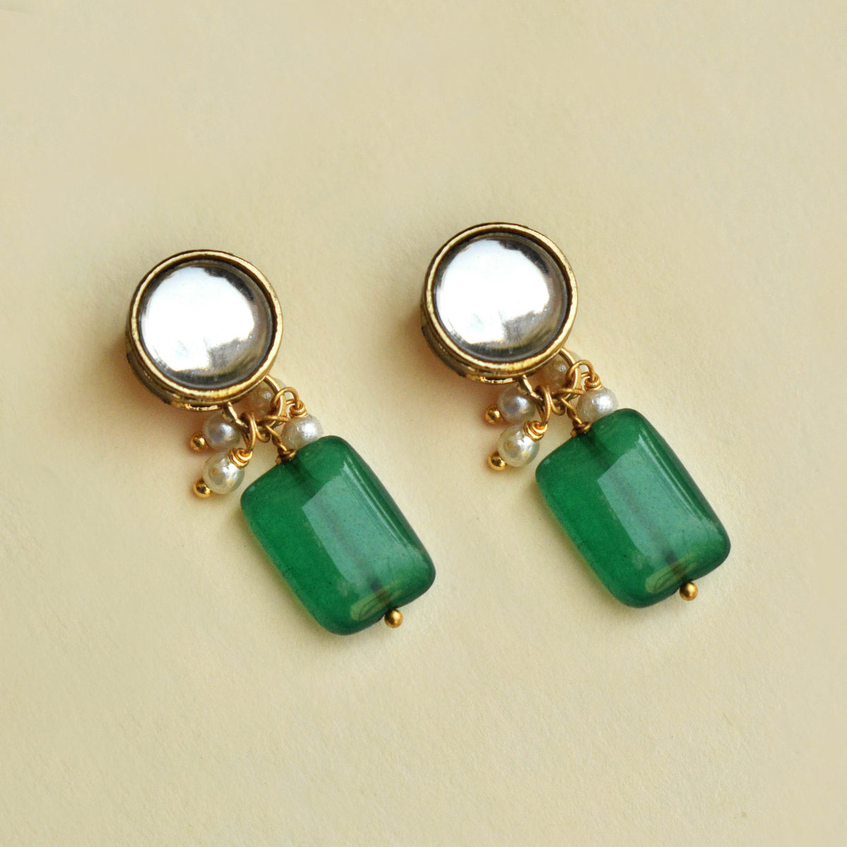 Traditional Kundan earrings in gold-tone, perfect for weddings and festive wear