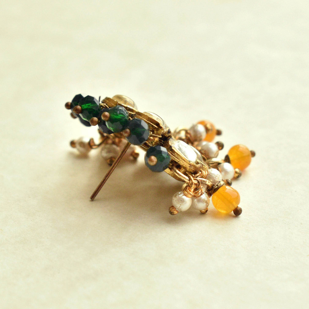 Traditional Kundan earrings in gold-tone, perfect for weddings and festive wear