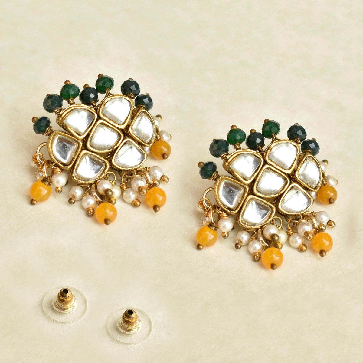 Traditional Kundan earrings in gold-tone, perfect for weddings and festive wear