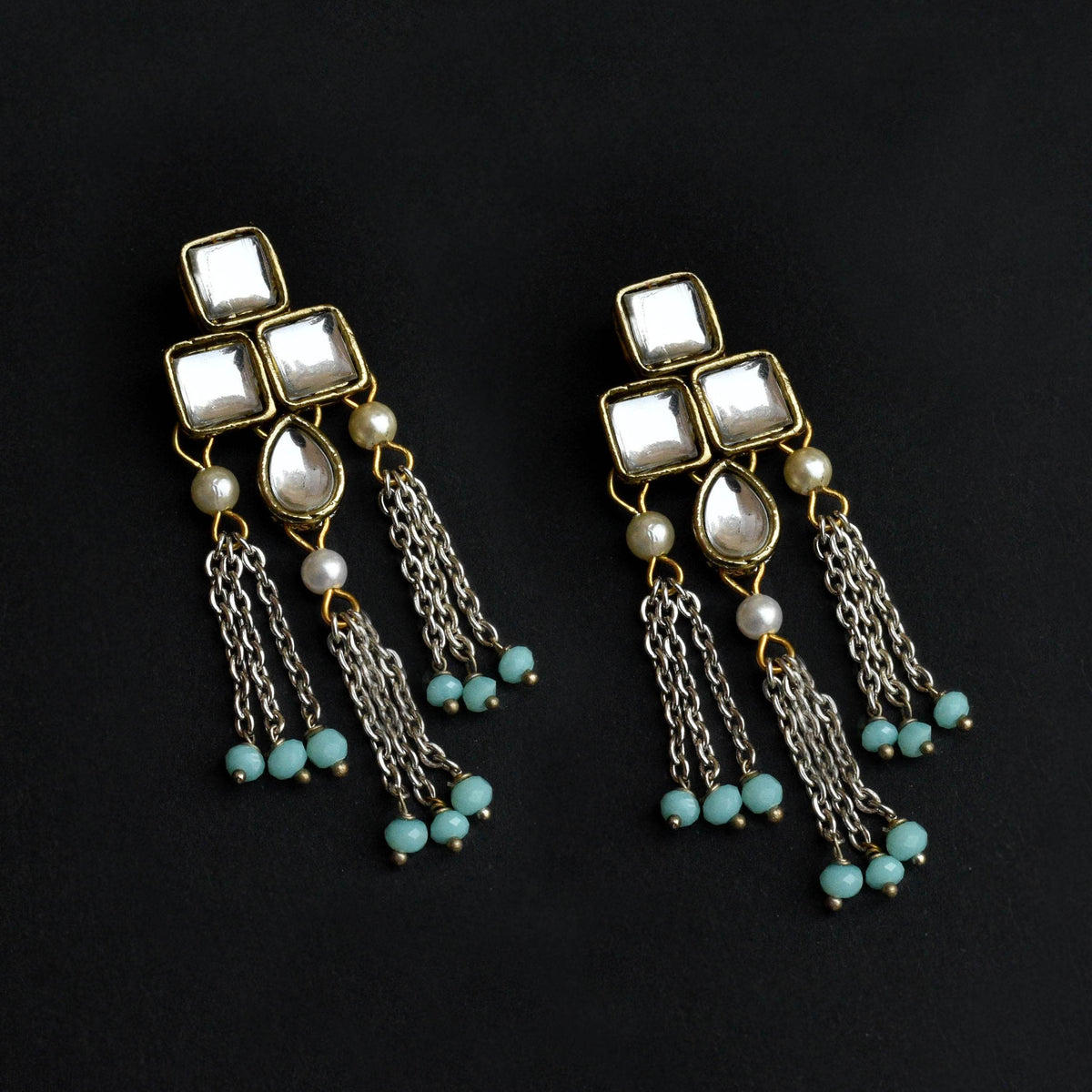 Traditional Kundan earrings in gold-tone, perfect for weddings and festive wear