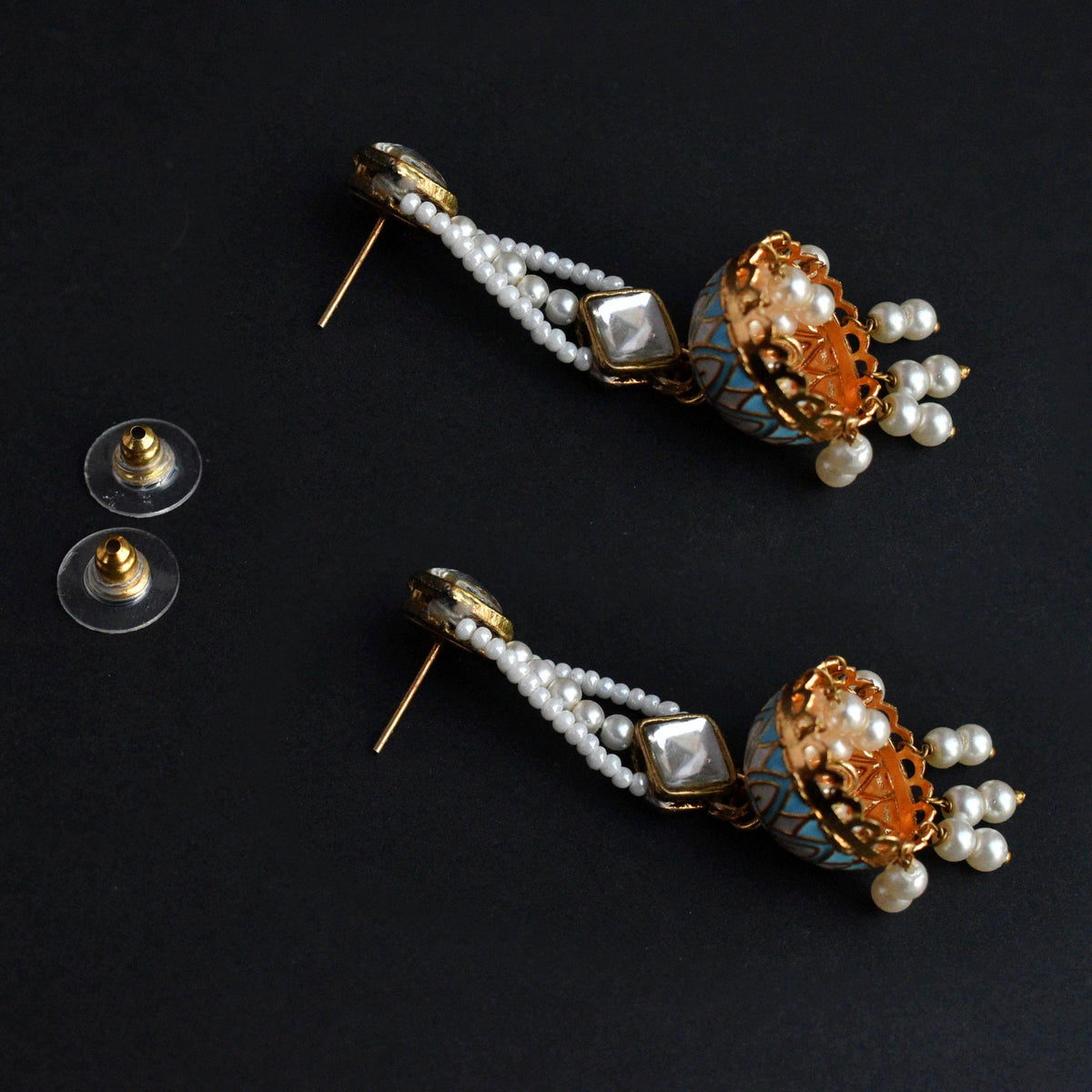 Traditional Kundan earrings in gold-tone, perfect for weddings and festive wear