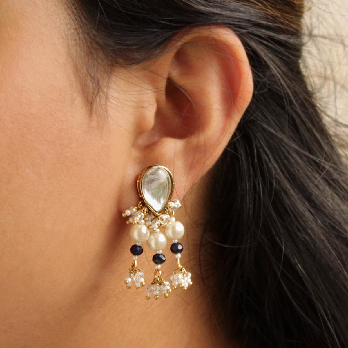 Traditional Kundan earrings in gold-tone, perfect for weddings and festive wear