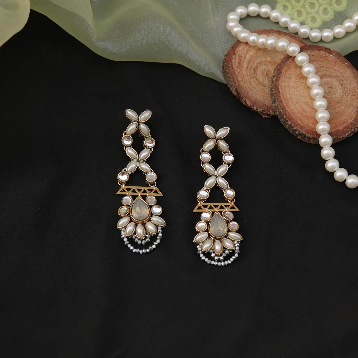 Traditional Kundan earrings in gold-tone, perfect for weddings and festive wear
